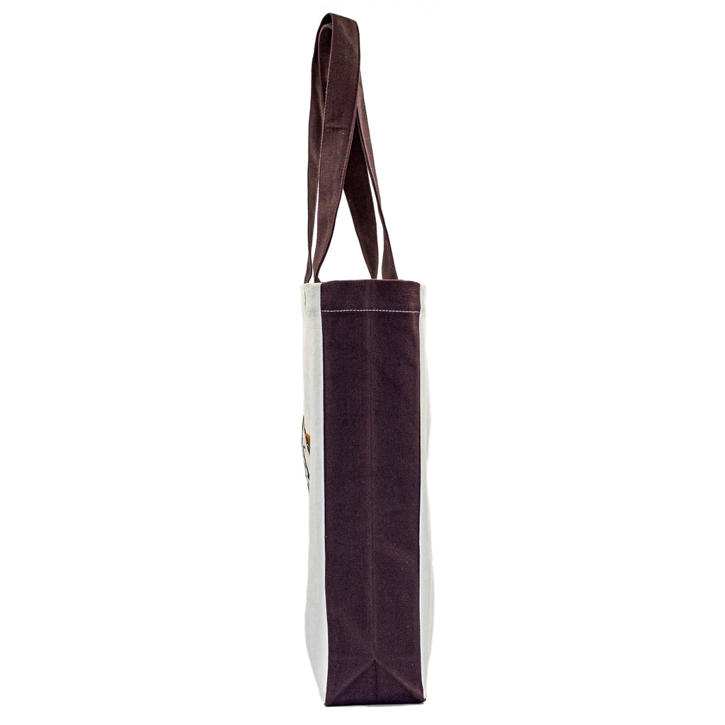 Carry Chic Tote Bag with white canvas body and brown handles by Serene Vogue