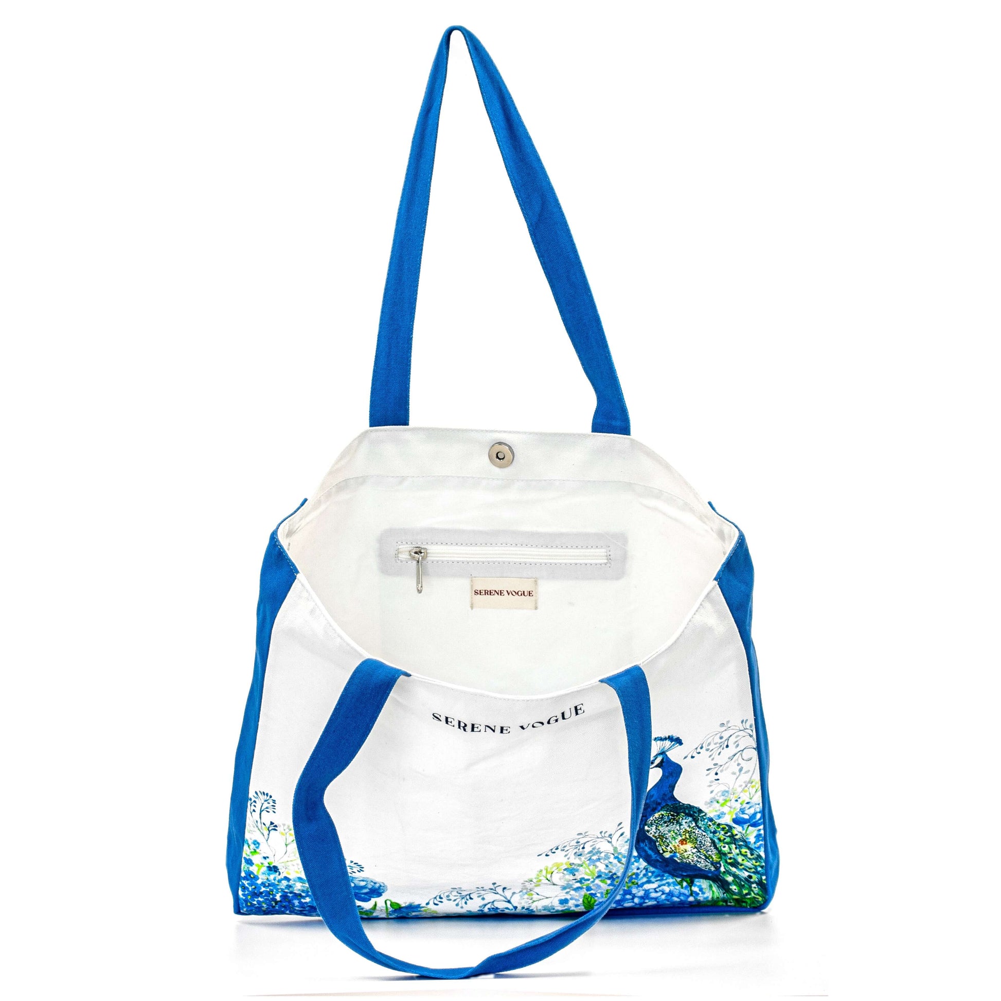 Peacock Panache Shoulder Bag with teal, gold, and emerald hand embroidery on premium canvas by Serene Vogue