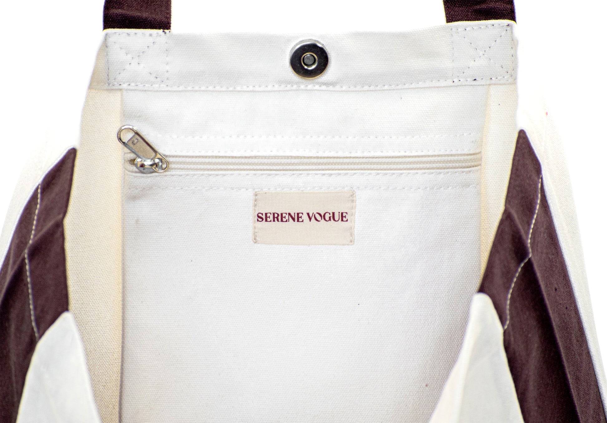Carry Chic Tote Bag with white canvas body and brown handles by Serene Vogue