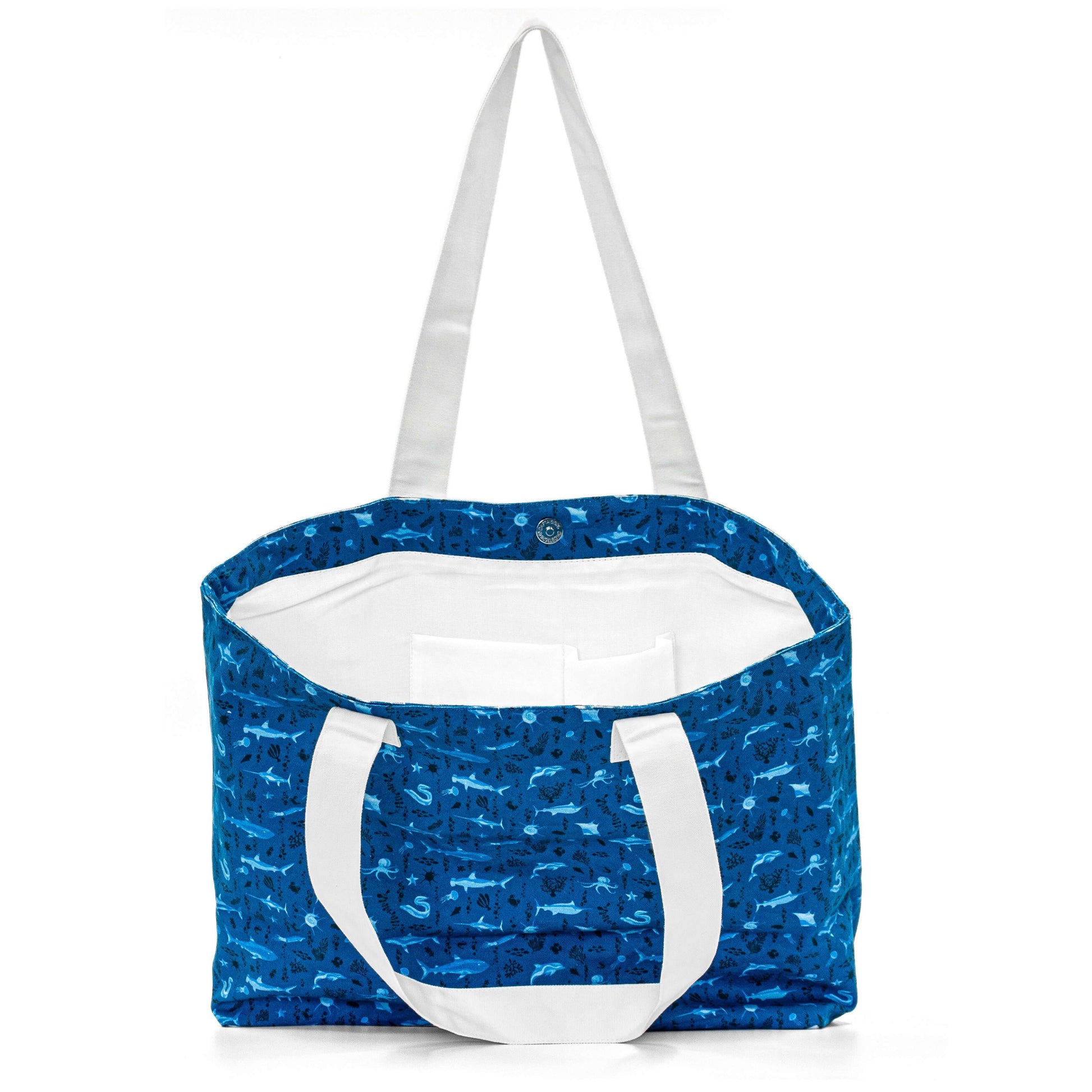Aqua Dolphin Carry-all Bag featuring ocean-blue dolphin print by Serene Vogue