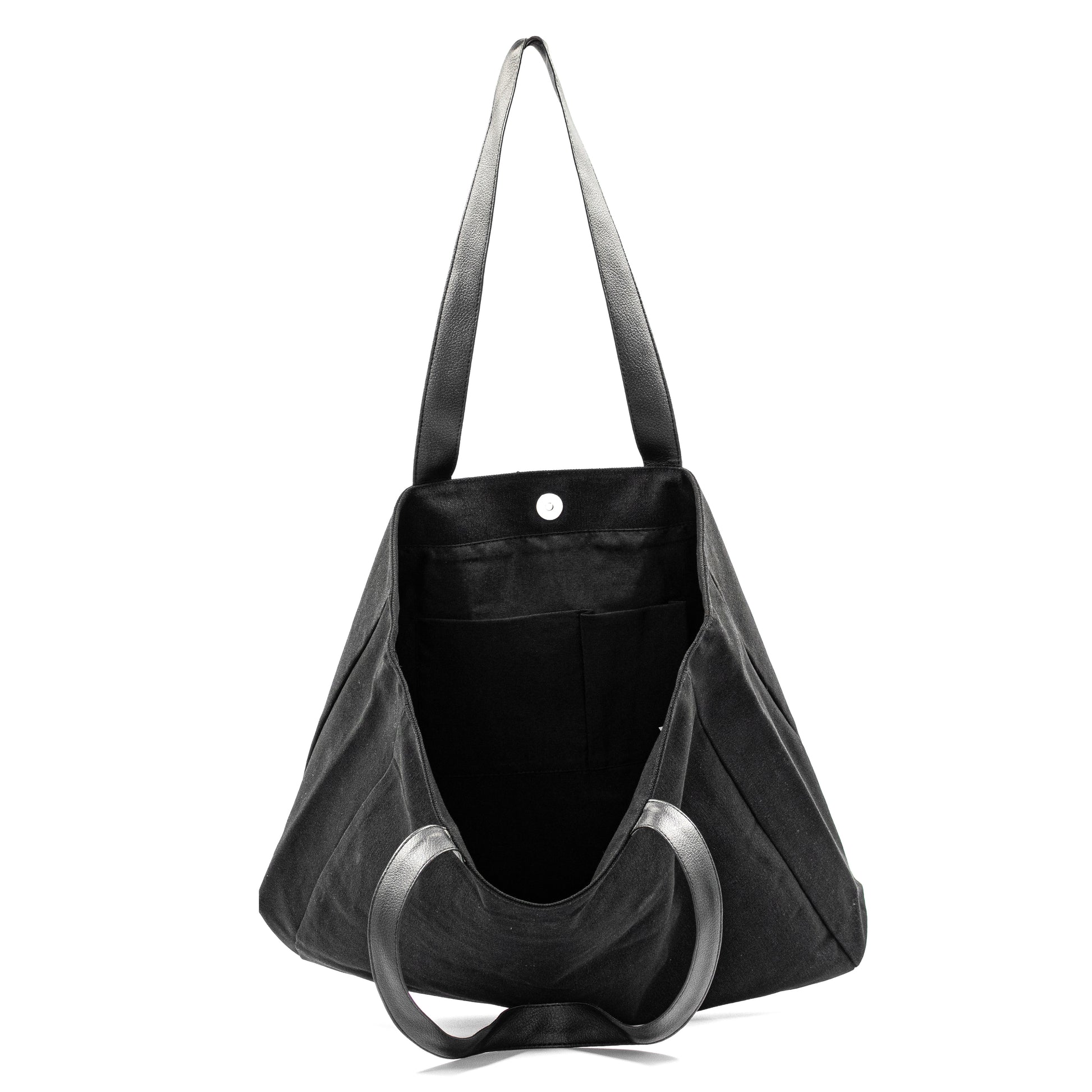 Elite Canvas Shopper Bag with Serene Vogue logo, reinforced handles, and inner zipper pocket