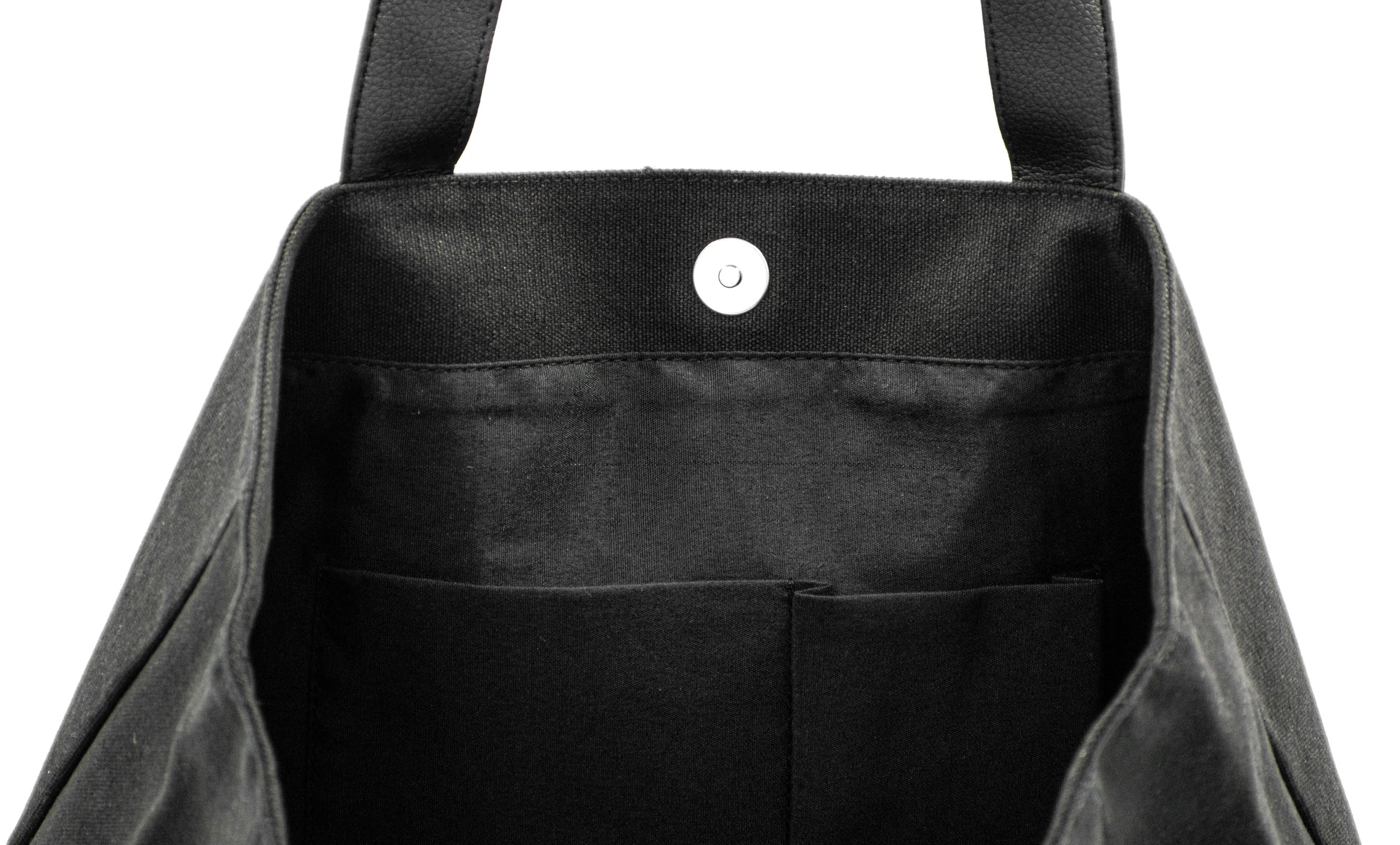 Elite Canvas Shopper Bag with Serene Vogue logo, reinforced handles, and inner zipper pocket