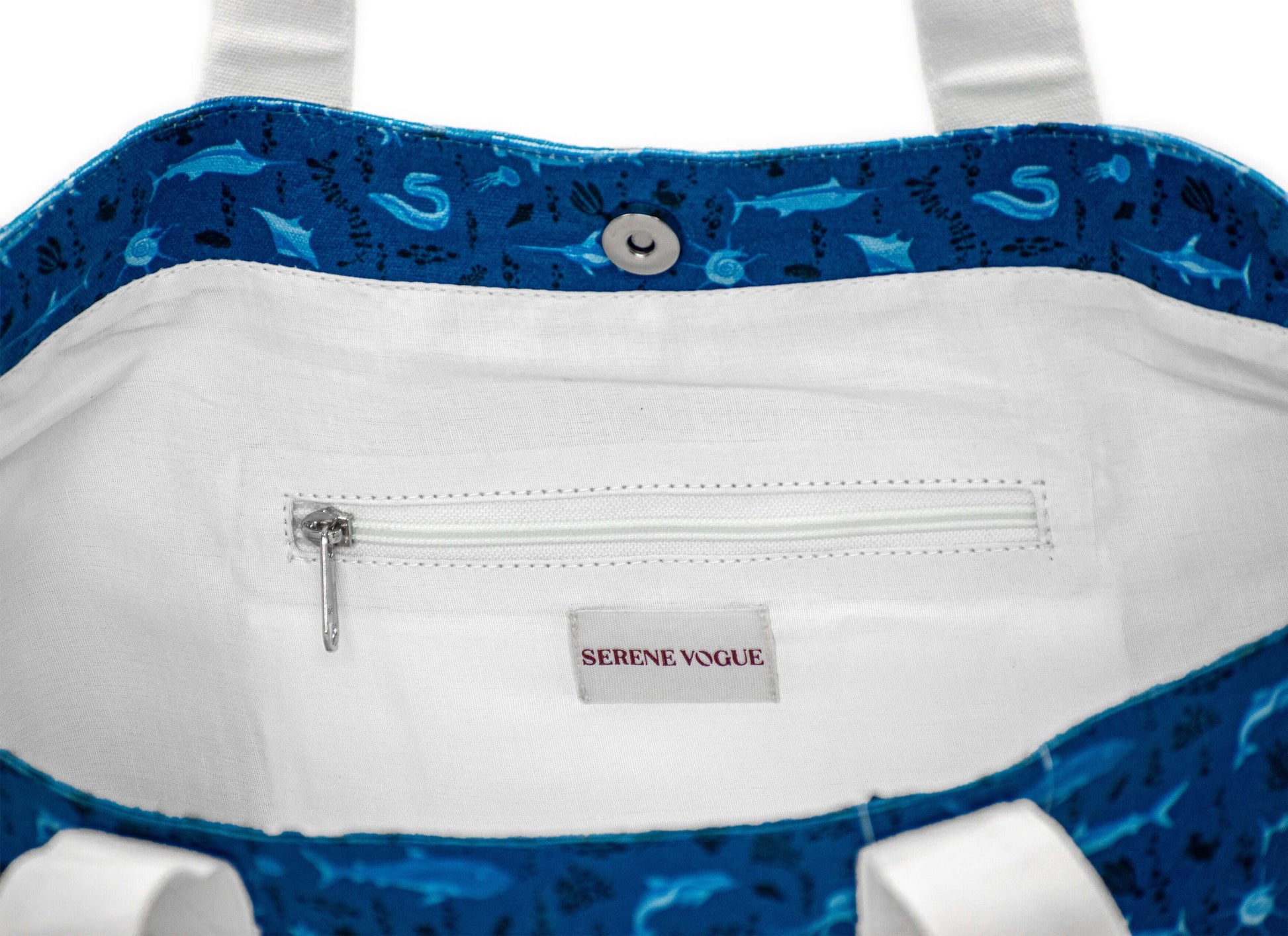 Aqua Dolphin Carry-all Bag featuring ocean-blue dolphin print by Serene Vogue
