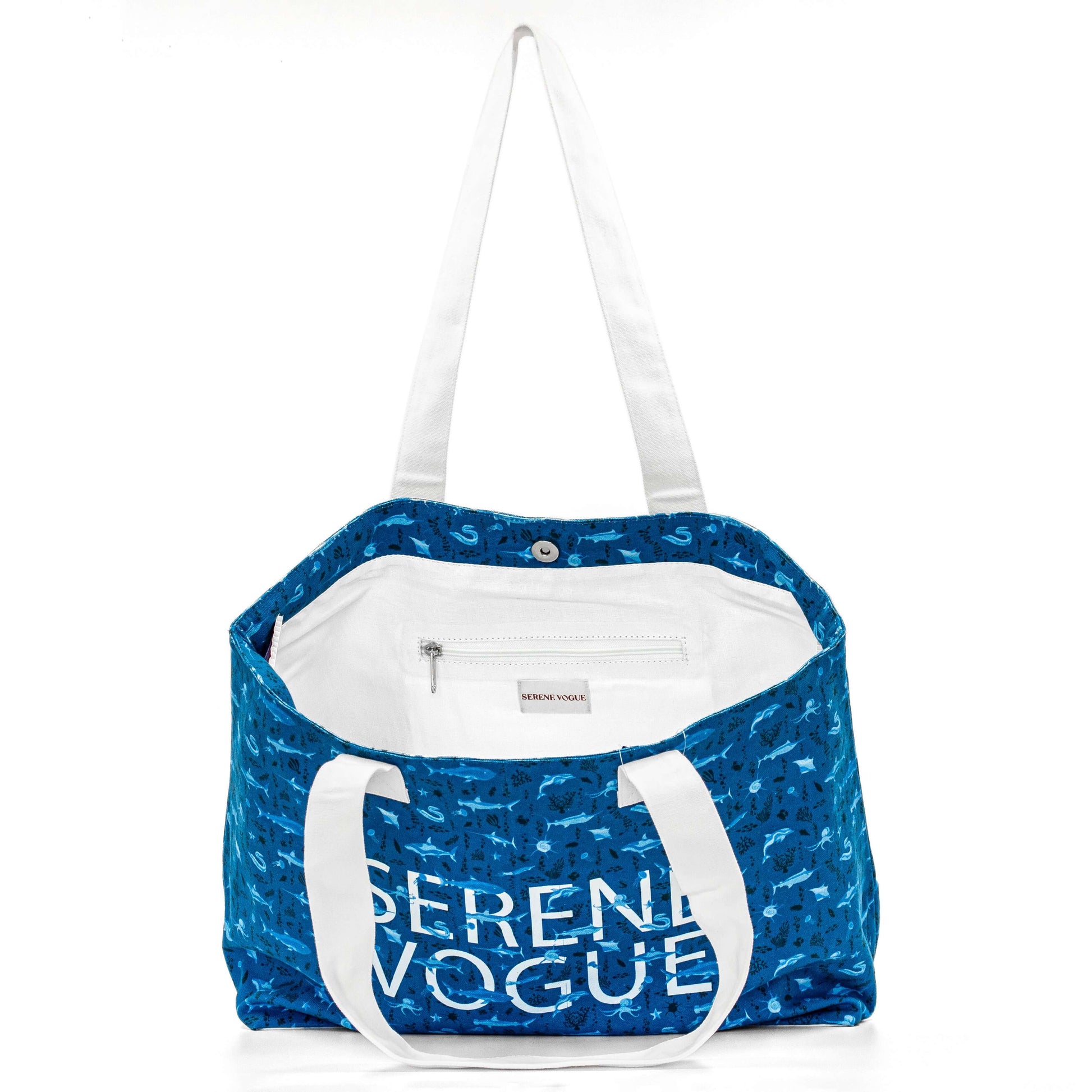 Aqua Dolphin Carry-all Bag featuring ocean-blue dolphin print by Serene Vogue