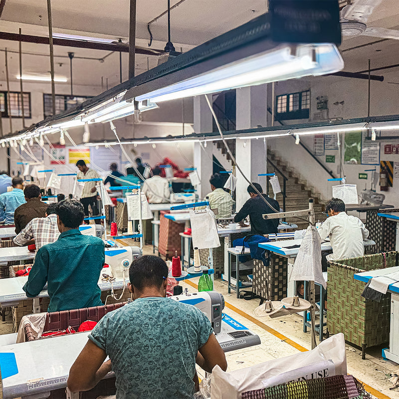 Meet the Hands Behind Your Bag_A look inside our factory in India, from the first cut to the final stitch_Fabrics are stitched and readied for assembly.